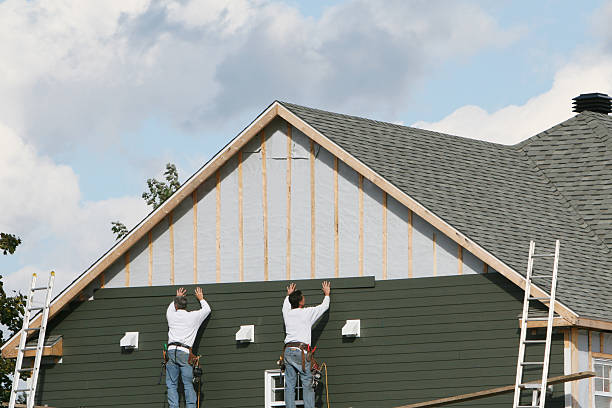 Professional Emergency Siding Repair technician working in Portage, IN
